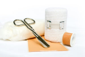 First aid bandage and scissor used in an ER